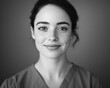 © Ryzhkov - Monochrome Medical Editorial Compassionate Nurse in Scrubs Featuring Soft TexturesHealthcare Inclusivity and Professional Branding for Modern Clinics