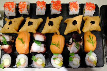 Wall Mural - Japanese sushi and maki buffet.