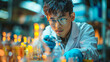 © Shivani - young male scientist working at chemical laboratory