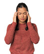 © Asier - Young Filipina woman touching temples and having headache.