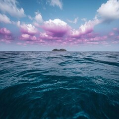 Canvas Print - Serene Ocean Landscape with Distant Island and Purple Clouds