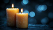 © JVLMediaUHD - Warm Yellow Candles Softly Glowing Against a Dark Blue Background With Shimmering Bokeh Lights