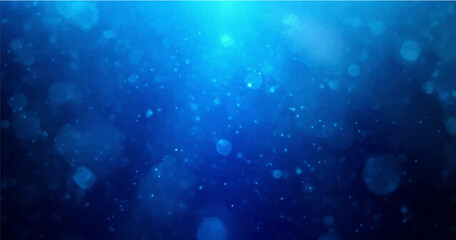 Wall Mural - backdrop of abstract bokeh particles in blue light