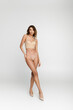 © LIGHTFIELD STUDIOS - Elegant style in lingerie showcases fashion and beauty in a chic setting