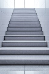 Poster - A clean, modern staircase leads upward, illuminated by natural light, showcasing a minimalist design with smooth, gray steps.