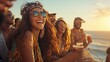 © J. Thamanoon - A Joyful Gathering of Friends Sharing Laughter and Memories on the Beach at Sunset