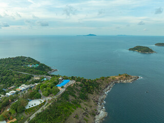 Fototapete - aerial view at Laem Promthep Cape viewpoint. Promthep cape is the most popular viewpoint in Phuket..Man island, Yanui beach small beach and wind turbine are also a sunset viewing spot..
