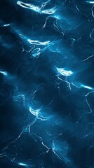 Wall Mural - abstract close-up of shimmering blue water, creating a tranquil and mesmerizing underwater effect.