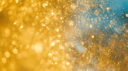 Wall Mural - Abstract close-up of water droplets on a surface, featuring vibrant yellow and blue hues, creating a dreamy, ethereal atmosphere.