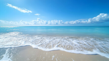 Wall Mural - a vast ocean with gentle waves under a perfectly clear blue sky