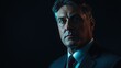 © spyrakot - Intense Business Executive with Dramatic Lighting for Cinematic Poster Design