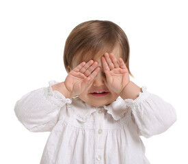 Wall Mural - Cute little baby girl playing peekaboo on white background