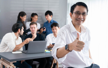 Aufkleber - Confidence and happy smiling businessman portrait making advertising posture with background of business team working in office. Office worker and positive workplace for job recruitment. Prudent