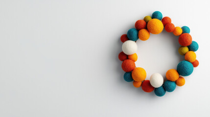 Wall Mural - easter community event. Colorful felt ball wreath with vibrant decorations and modern design