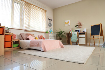 Wall Mural - Interior of children's room with bed, table and chalkboard