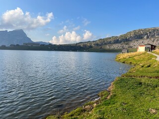 Poster - The alpine lake Melchsee or Melch Lake in the Uri Alps mountain massif, Kerns - Canton of Obwalden, Switzerland (Kanton Obwald, Schweiz)