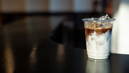 Wall Mural - glass of coffee on the table