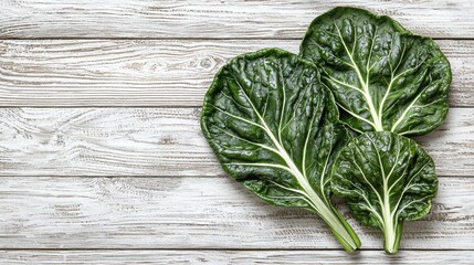 Poster - Fresh chard leaves on rustic wooden background, healthy food concept