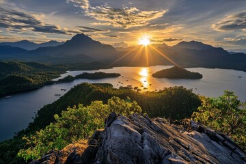 Wall Mural - A stunning sunrise over the serene Lake Panao, with mountains and lush greenery in the background, captured from atop Mount Samalayon's peak. 