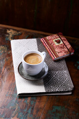 Wall Mural - Cup of coffee on wooden background. Soft focus. Copy space.	