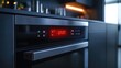 © sujitea - A modern oven with a digital touchscreen interface and a preheating indicator glowing red.