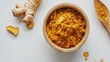 © dong - Fresh Ginger Root in Bowl on White Background: A Simple and Elegant Ingredient Display