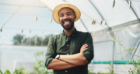 Wall Mural - African man, smile and arms crossed in greenhouse, farming and growth with sustainability in summer. Person, happy and portrait with food production, agriculture and nursery for vegetables in Kenya