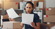 © peopleimages.com - Confused woman, logistics or documents with invoice for shipping cost or delivery expense at warehouse. Female person, distributor or inspection with paperwork for supply chain or budget at depot