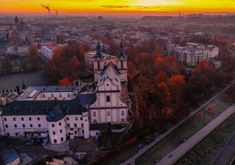 Wall Mural - Wawel castle with Basilica of St. Michael the Archangel in Krakow Poland. Autumn landscape on coast river Wisla.