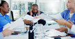© peopleimages.com - Frustrated man, doctor or headache with documents in meeting for overworked stress or anxiety at hospital. Businessman, board director or fatigue with migraine for clinic chaos or bad medical funding