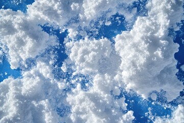 Wall Mural - fluffy cloudscape, aerial view, bright blue sky, sunny day, background texture