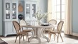 © Pannee - A coastal-inspired dining room with Morning Sand walls and rattan accents.