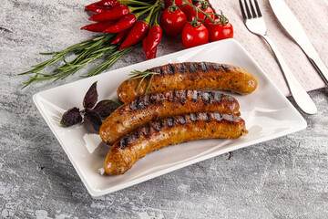 Wall Mural - Grilled meat sausages with spices