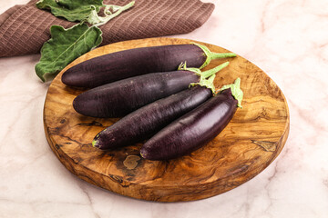 Poster - Small few baby eggplant over board