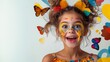 © Trushchenko_O - Young girl with colorful face paint and butterflies in her hair. She is smiling and looking up at the camera