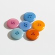 © Ankit - Colorful Buttons on White Background