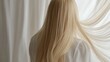 © pornsawan - Beautiful model girl with Blond hair strand,silky healthy wavy hair strand,hair wavy ribbon, with smooth,Keratin straightening,Treatment,straight long hair,procedures,Smooth hairstyle.