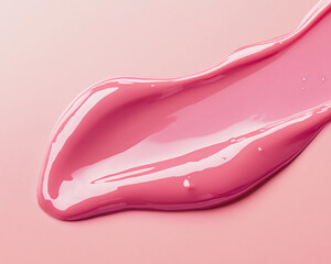Leinwandbilder - Close-up of pink liquid flowing on a soft pastel surface, showcasing a smooth, glossy texture, symbolizing fluidity, elegance, or beauty.