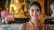 © Chayanin Wongpracha - smiling asian woman in traditional clothing