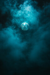 Poster - A moody nightclub environment where a single disco ball throws prismatic patterns onto swirling