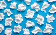 © Jamal - Abstract Whipped Cream Texture on Blue Background