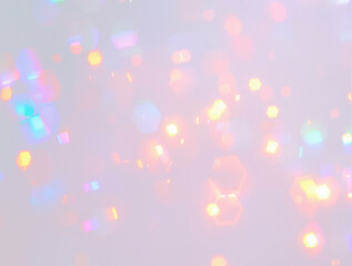 soft pastel bokeh hexagon shaped lights with blurred iridescent and rainbow hues, sparkly, grain ove