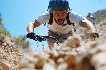 capturing a mountain biker in action, this photo highlights the physical struggle and determination 