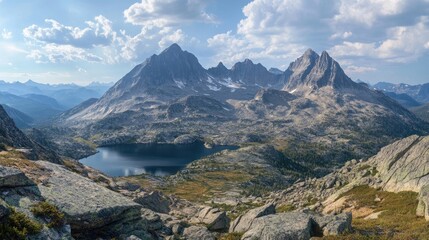 Wall Mural - Panoramic view of rugged mountain ranges and rolling hills