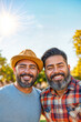 © Mau Martinez Cosio - Two bearded Latino male friends Smiling and Bonding in California