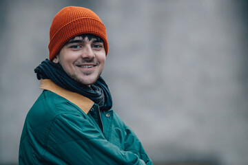 Wall Mural - portrait of young man with hat and warm clothes