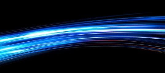 Wall Mural - blue light trails, long exposure light painting on black background, blurred motion effect