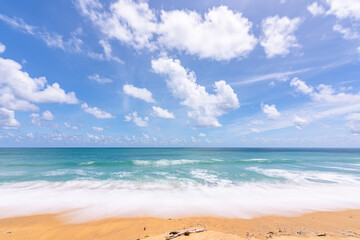 Wall Mural - Empty tropical beach and seascape, Beautiful sandy beach and sea in sunny day,Blue sky in good weather day, Beach sea space area nature background