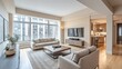 © Plaifah - A spacious living room with large windows, an open floor plan, and a neutral color palette, including a comfortable sofa, coffee table, and a stylish entertainment center.