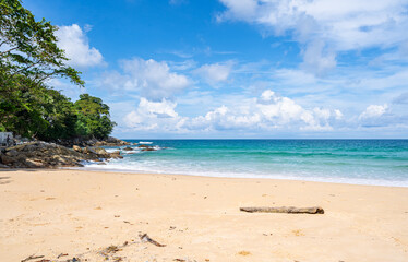 Wall Mural - Empty tropical beach and seascape, Beautiful sandy beach and sea in sunny day,Blue sky in good weather day, Beach sea space area nature background